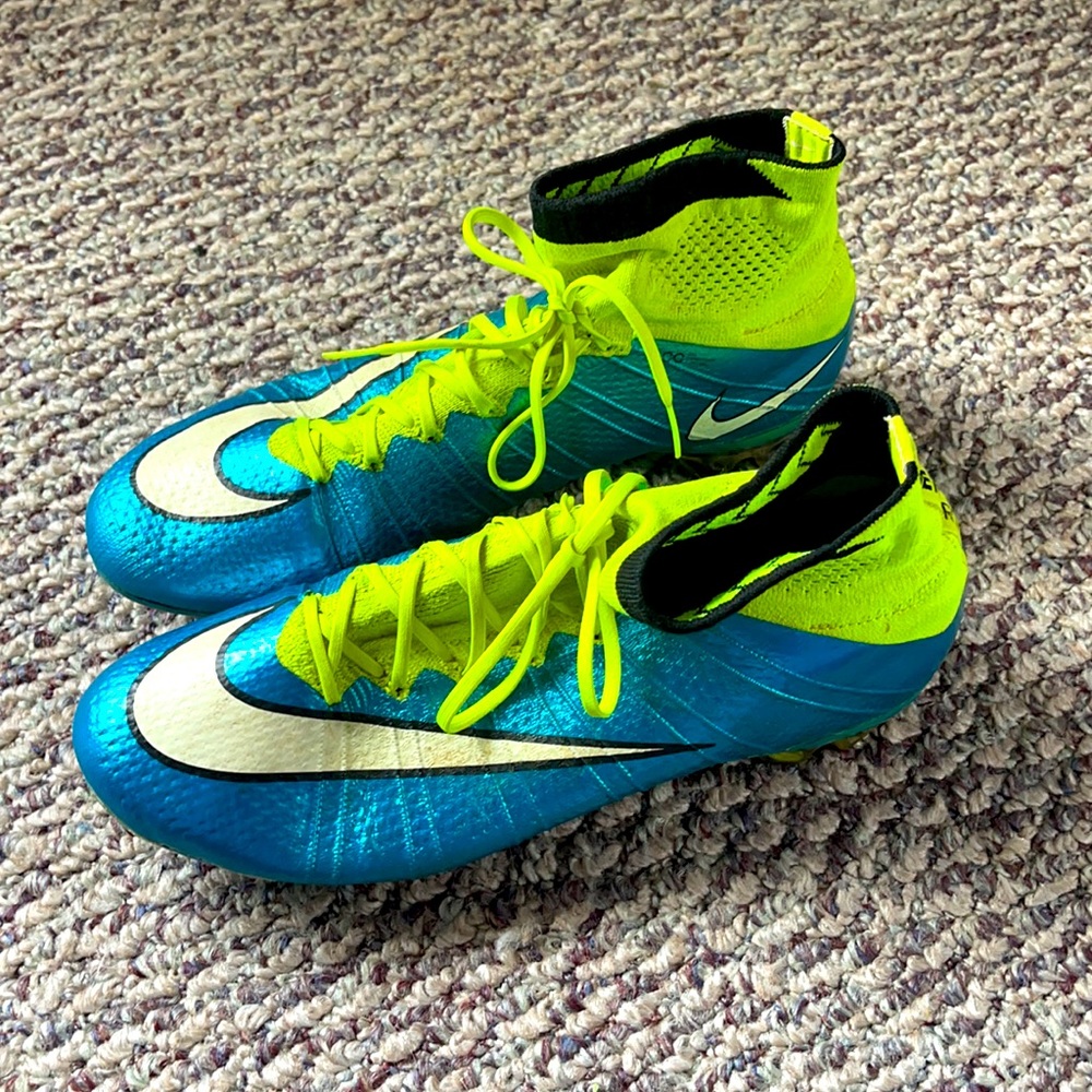 Vibrant blue and neon green Nike soccer cleats